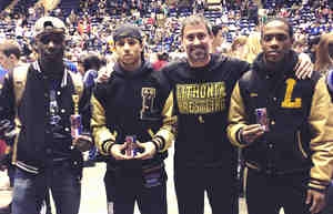 Coach Patrick Ryan (second from right) finished up his final year with three state placers for Lithonia in (l-r) Shamel Findley, Kirkglen Hudson, Ryan and Chris Morgan. (Courtesy Photo)