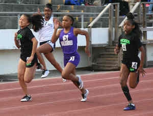 Tucker sprinter Jessica Shelley (far right) beat (l-r) Peachtree's Yasmin Harrington, Tucker teammate Joann Nguyen and Miller Grove's Kai Ngozi for the 100 meter dash gold. (Photo by Mark Brock)