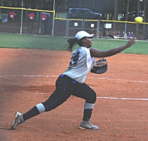 Stephenson's Kayla Ambler makes a throw after fielding a bunt against Dunwoody. (Photo by Mark Brock)
