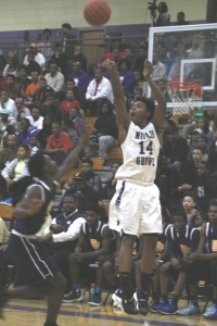 Miller Grove's Colin Young (14) had 15 points to lead the Wolverines past Glenn Hills.
