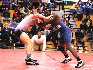Redan's Carlos Goodman (right) put together a gold medal winning performance at the Area 6-4A Traditional Wrestling Championships.  (Photo by Mark Brock)