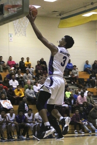 Miller Grove's Jaylen Mason glides in for a layup. (Photo by Mark Brock)