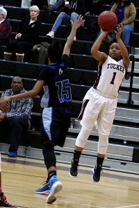 Tucker guard Jayla Morrow shoots over a Campbell defender during the Lady Tigers Class 6A first round playoff victory. (Photo by Mark Brock)
