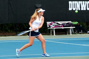 Dunwoody's Gracie Ackaway has the southpaw backhand return in her No. 2 doubles victory with teammate Ashton Harbin. (Photo by Mark Brock)