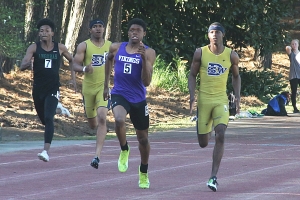 Lakeside freshman Brian Herron (center) won the 200 meter dash and finished second in the 400 meter dash in the Region 2-6A Track Championships. (Photo by Mark Brock)
