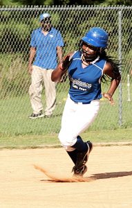 Stephenson's Brierra Warren heads home for an inside the park homer against Columbia. (Photo by Mark Brock)