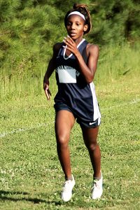 Arabia Mountain's Alyssa McGriff defended her turf with a win in the first girls' race at Arabia Mountain. (Photo by Mark Brock)