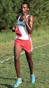 Druid Hills' Ermais Tewolde ran the fastest time at Arabia Mountain in the first meet held at the trail this season. (Photo by Mark Brock)