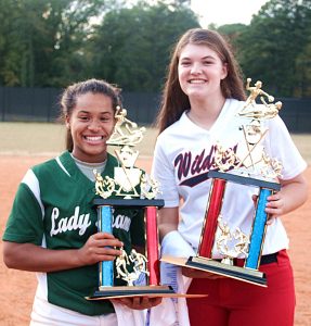 Arabia Mountain pitcher Kayla Phillips (left) won the Red MVP Award while Dunwoody's Megan Pierce captured the Blue MVP Award. The Red defeated the Blue 15-8. (Photo by Mark Brock)