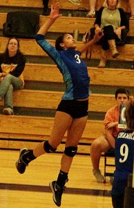 Chamblee's Cana Dee goes up for a game-clinching kill against Harris County. (Photo by Mark Brock)