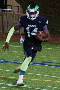 Arabia Mountain's Samad Noble tossed a pair of touchdown passes, but his Team Zoom sqaud fell just short in a 21-13 loss to Team World Star.  (File photo by Mark Brock)