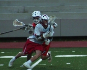 Dunwoody's Sean Fox cuts towards the goal on the way to one of his three scores in the 9-5 victory over the Parkview Panthers.