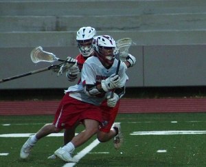 Dunwoody's Sean Fox cuts towards the goal on the way to one of his three scores in the 9-5 victory over the Parkview Panthers. (Photo by Mark Brock)