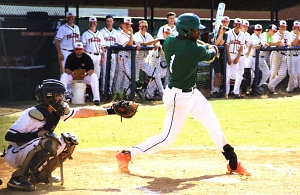 Arabia Mountain's Silas Butler puts the ball in play during Game 3 of the Rams' Class 5A playoff series against Flowery Branch. (Photo by Mark Brock)