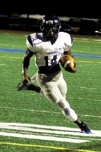 Redan's Dennis Roberson turns upfield during action earlier this season. (Photo by Mark Brock)
