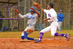 Chamblee's Travis Hammond (left) slides in safely ahead of a throw to Miller Grove's Jathan Smith. (Photo by Mark Brock)