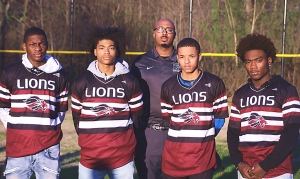 Martin Luther King Jr. Lions players (Front, l-r) Varick Lawrence, Antoine Lloyd, Lamont Barner and Jeremy Cain all played a big role for Coach Greg Boatwright (back row) during the Lions two big Region 4-6A wins during Week 5 of the baseball season. (Photo by Mark Brock)