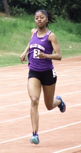 Miller Grove senior Emoni Coleman became an eight-time DCSD champ with wins in the 800 and 1600 meter runs. (Photo by Mark Brock)