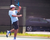 Chamblee's Hap Howell clinched the Bulldogs trip to the Class 5A state title match with his 6-4, 6-3 win at No. 3 singles over Buford's Luke Davidson. (Photo by Mark Brock)