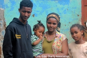 Former Clarkston cross country runner Bineyam Tumbo (far left) is finding ways to give back to his native Ethiopia while finished college. One way is serving the Love Order Charity Association and orphanages in Ethiopia.
