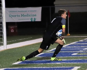 Lakeside's Andrew Seybolt with one of his eight saves against Lambert. (Photo by Mark Brock)