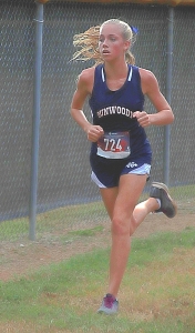 Dunwoody's Claire Shelton, an eighth grader, easily won the boys' individual title at the DCSD JV Cross Country Championships. (Photo by Mark Brock)