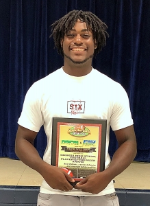 Cedar Grove defensive end Alvin Williams receives GHSFD Player of the Week Award.