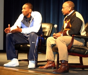 The late Kobe Bryant (left) speaks with athletes and students at Columbia High in 2007. Columbia head boys' basketball coach Phil McCrary (right) led the question and answer session. (Photo by Mark Brock)