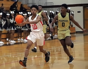 Druid Hills Avery Covington (10, shown here against McDonough earlier this season) hit some clutch free throws to lead the Red Devils to a playoff clinching 45-44 win over No. 3 seed Salem at McDonough on Monday. (Photo by Mark Brock)