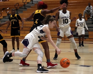 Lakeside's Ella Steed (22) dribbles past a Central Gwinnett defender. (Photo by Mark Brock)