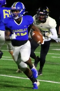 Chamblee running back Brayson Seaborne (22) gets loose on his way to a 36 yard touchdown run. (Photo by Mark Brock)