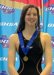 Chamblee's Kyla Maloney won her second consecutive gold medal in the 100 baskstoke and was part of two gold medal relay teams in the GHSA Class 4A/5A Girls State Swimming Championships. 