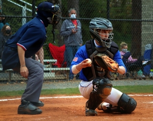 Chamblee catcher Isaac Harkins checks a runner at first during action against Decatur. (Photo by Mark Brock)