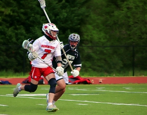 Dunwoody's Zach Rosing scored six goals, including two in the final three minutes, to lead the Wildcats to an 8-6 Area 6A/7A victory over North Atlanta at Avondale Stadium on Friday night. (Photo by Mark Brock)