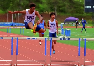 Southwest DeKalb's Isaiah Taylor swept the Region 5-5A hurdle events to lead the Panthers to a second-place finish. (Photo by Mark Brock)