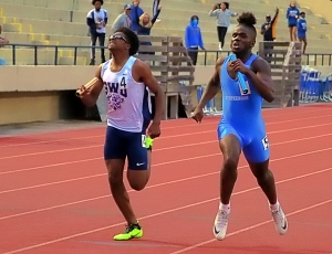 Southwest DeKalb's Isaiah Taylor (left) and Stephenson's Isaiah Screen (right) had a photo finish in the 4x100 relay with Screen edging Taylor out for the gold. (Photo by Mark Brock)