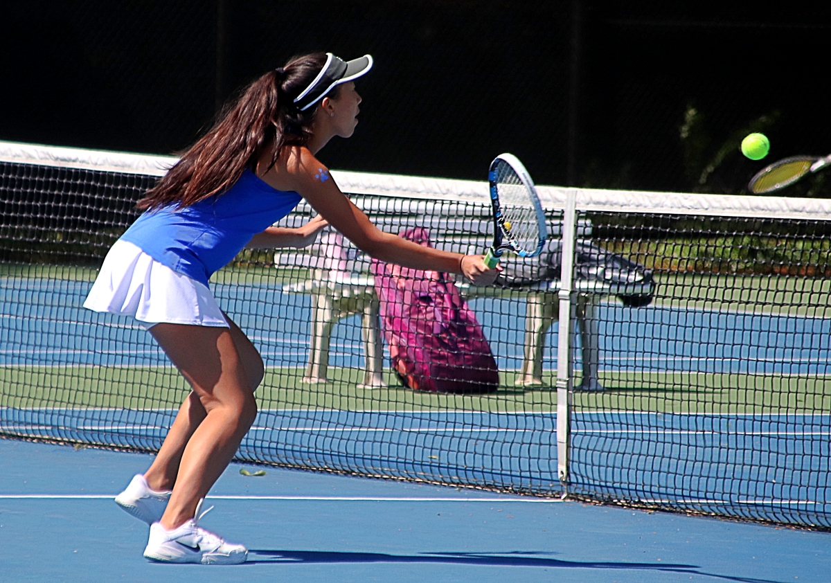 Chamblee's Sophia Cheng on a return as she and No. 1 doubles partner Allison Lvovich won their match 6-4, 6-0. (Photo by Mark Brock)