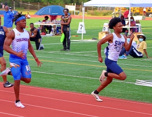 Southwest DeKalb's Antonio Davis (right) won the 100-meter dash over Columbia's Jordan Ammos and went on to capture gold in the 200-meter dash. (Photo by Mark Brock)