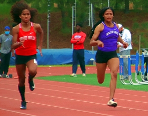 Druid Hills Sanaa Frederick (left) and Miller Grove's Angelica Frederick (right) finished 1-2 in the Region 6-4A 100 and 200 dashes. (Photo by Mark Brock)