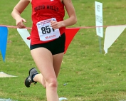 Senior Katie Blount finished eighth in the Class 4A girls' race to lead the Lady Red Devils to a second consecutive sixth place finish in the state meet. (Photo by Mark Brock)