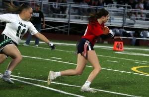 Dunwoody's Hayden Woods cuts up field against Greenbrier in the Division 2 flag football quarterfinals. Greenbrier held off Dunwoody 6-0 to advance. (Photo by Mark Brock)
