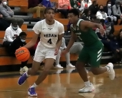 Redan's Christian Kenerly (4) drives past Westminter's Kamden Coleman (10) during the Raiders' 41-39 Region 5-3A win on Tuesday. Kenerly would hit the game-winning free throws with 7.4 seconds to play. (Photo by Mark Brock)