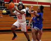 Stone Mountain's Kyra McCrary (40) puts up a shot against the Chamblee Lady Bulldogs' defense. Chamblee won 57-41 to even the season series at one win apiece. (Photo by Mark Brock)