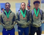 Southwest DeKalb led all DeKalb wrestling programs with three wrestlers placing at the GHSA Traditional State Wrestling Meet. The three were (l-r) Isaiah Scott (4th), Jerrell Baskins (6th) and Jordan Reed (6th). (Courtesy Photo)