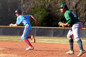 Druid Hills Cullen Riel (9) takes off for second and Arabia Mountain first baseman Colin Coefield (15) watches the pitch. Riel would pitch six innings to get the win on the mound for Druid Hills in the 7-4 victory. (Photo by Mark Brock)