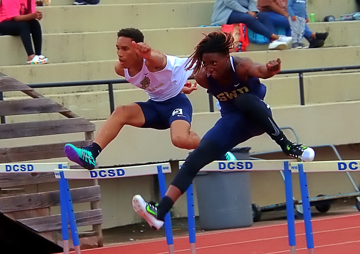 Tyon Reed (right) ran to Southwest DeKalb's only gold medal with an 0.08 win over Decatur's Ethan Johnson (left) in the 110M hurdles. (Photo by Mark Brock)