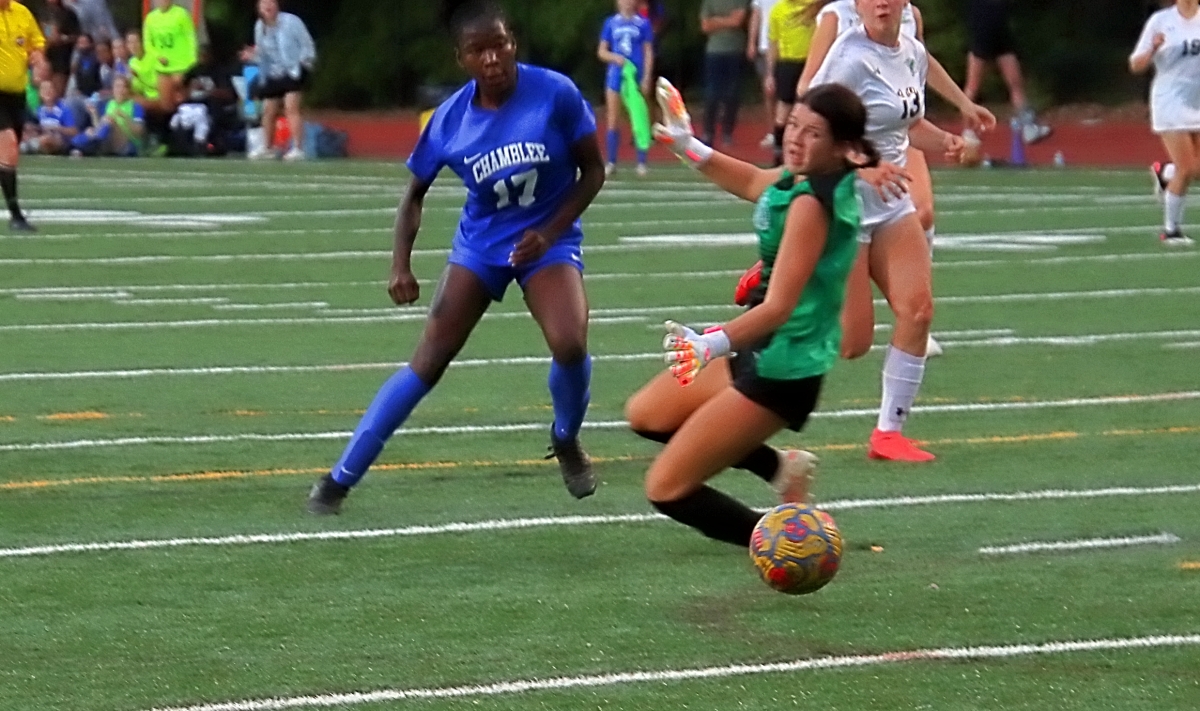 Chamblee's Kara Croone (17) puts shot past McIntosh keeper Avery Heeb for her second of four goals in the Lady Bulldogs 6-2 Class 5A Elite 8 state playoff win. (Photo by Mark Brock)