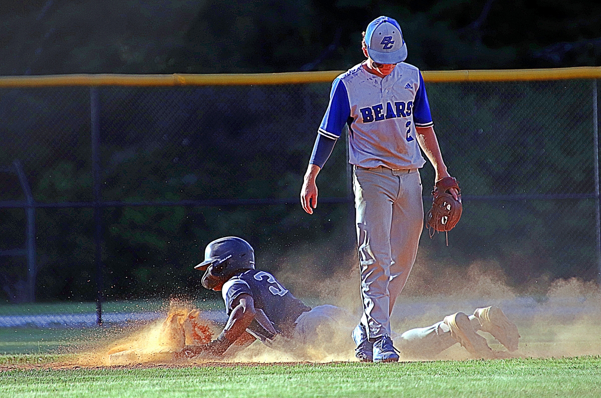 A sliding Eyon Everett picks up an easy stolen base in Redan's win against Burke County. (Photo by Mark Brock)