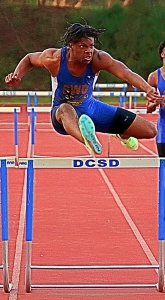 Southwest DeKalb's Isaiah Taylor swept both the 110 and 300 hurdles at the Class 5A state sectional last weekend. (Photo by Mark Brock)