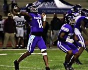 Miller Grove's Christian Jamison throws deep to Keshawn Weaters for a 55-yard scoring strike. (Photo by Mark Brock)